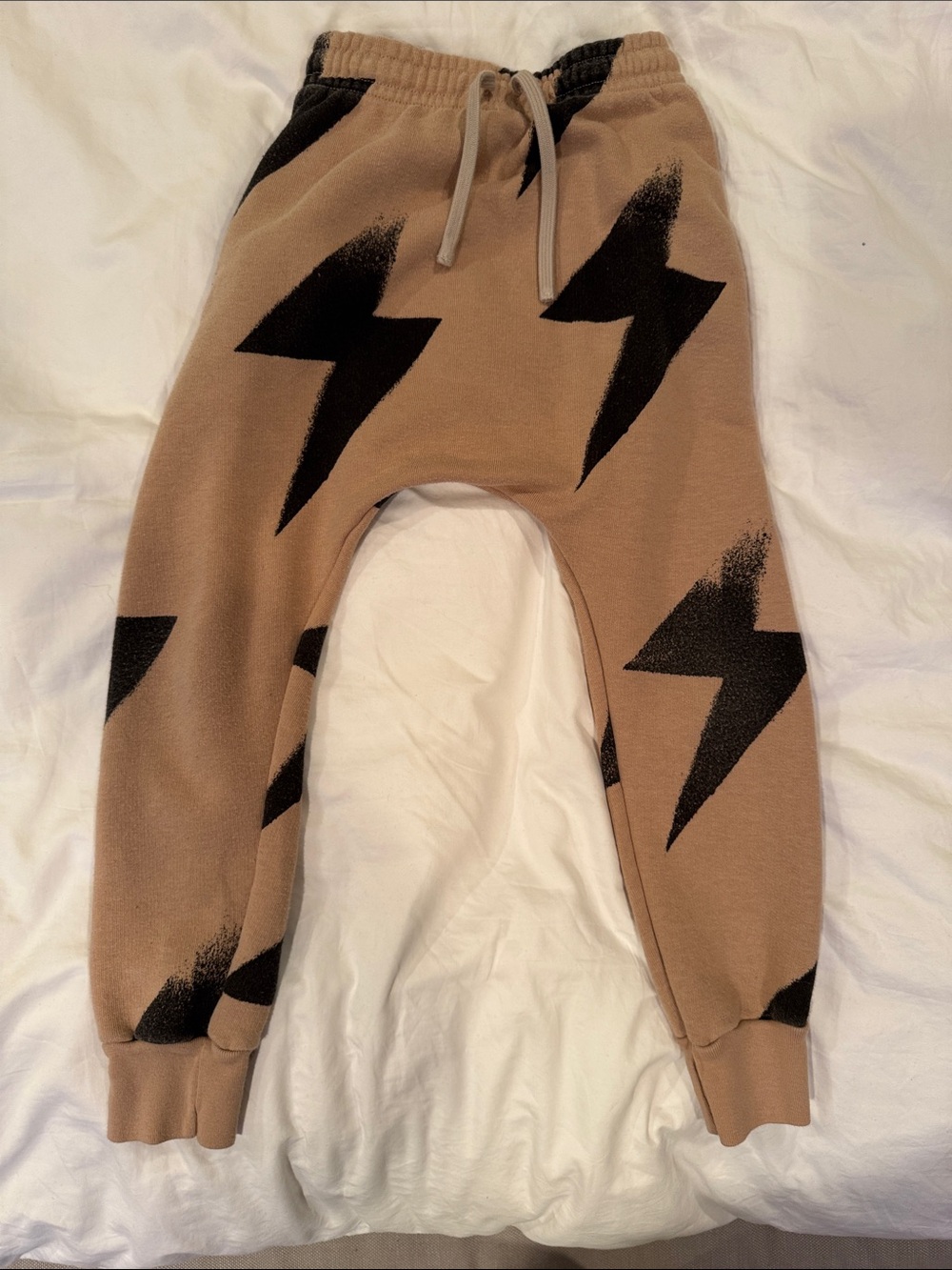 nununu Tan Joggers with Black Lightning Print